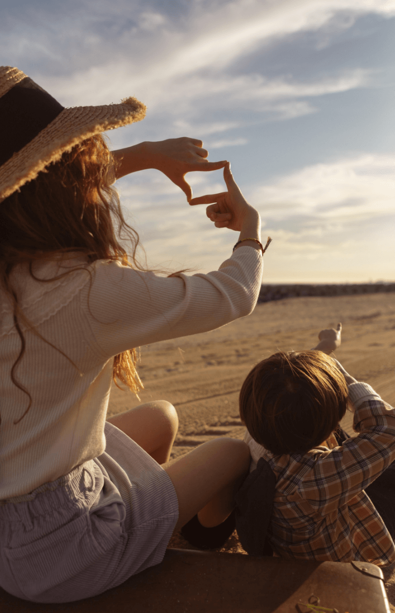 smiling-girl-looking-mother-park